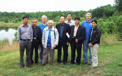 group photo of remediation team in field