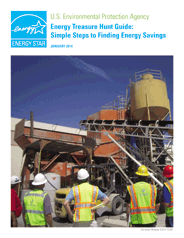 This is a picture of workers looking at a power plant.