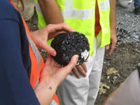 A section of the pavement to show the thickness of the pavement in place on the parking lot.