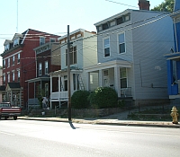 Photo illustrating how chemicals in runoff from road and home maintenance are carried by snow melt and storms.