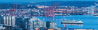 An image of ship coming into a harbor and city skyline in background. A link to https://www.epa.gov/ports-initiative/best-clean-air-practices-port-operations