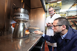 Researcher testing cookstove