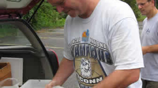 Volunteer getting ready to sort macroinvertebrates.