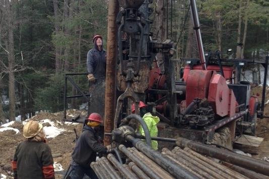 An old oil well being cleaned and properly recapped to protect groundwater from contamination.