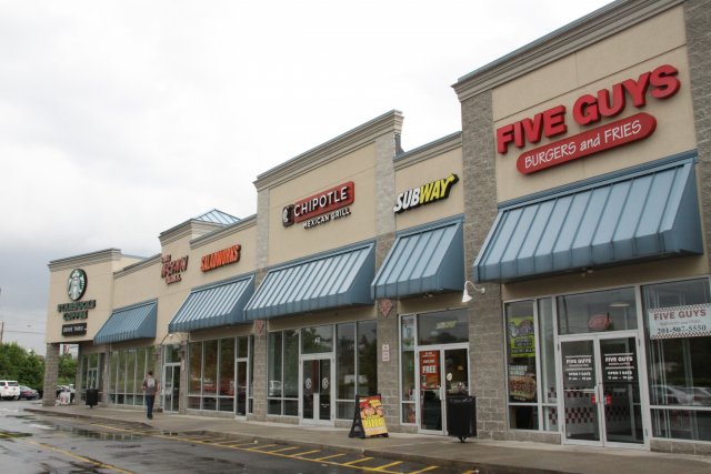 Store fronts at the Retail Plaza onsite