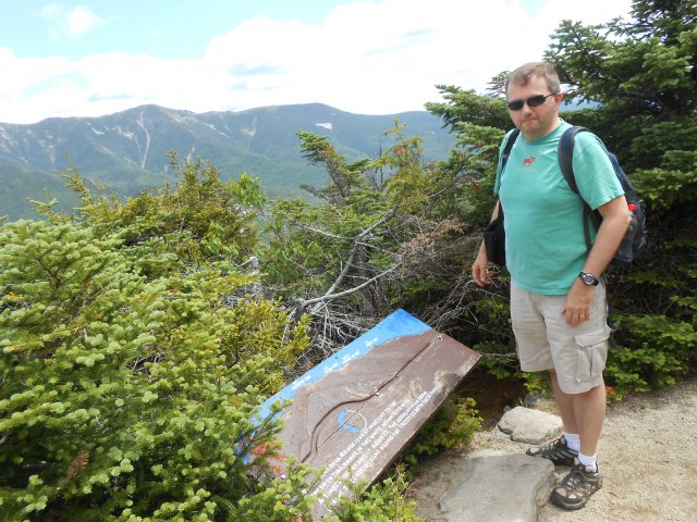 EPA researcher Lukas looks over mountains