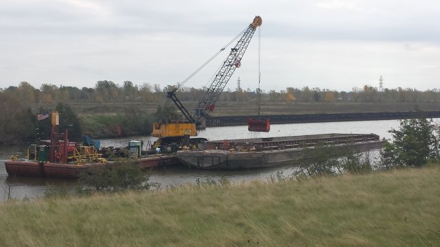 Mechanical dredging in the Buffalo River (Credit: Brian Murphy)