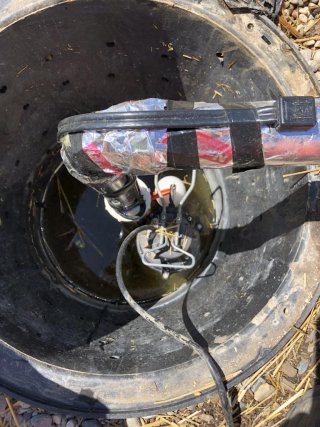 Sump pump installed near I-696 to pump groundwater to upper frac tanks