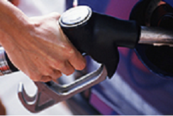 A person fills up their car with gasoline