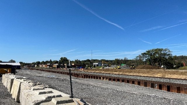 Clear blue sky and gravel area behind Leake Oil in East Palestine, Ohio