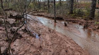 Stream damage from illegal sediment discharges from the Swinerton solar farm construction site in Alabama.