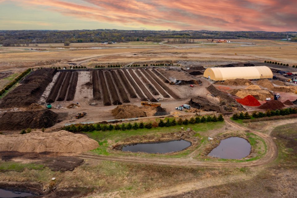 This image is of the SMSC recycling facility which looks like a plot of land with a large building 