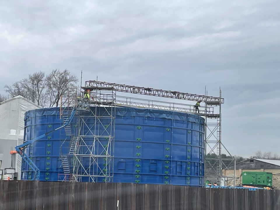 Scaffolding and trusses to suspend heating elements inside of the big blue tanks