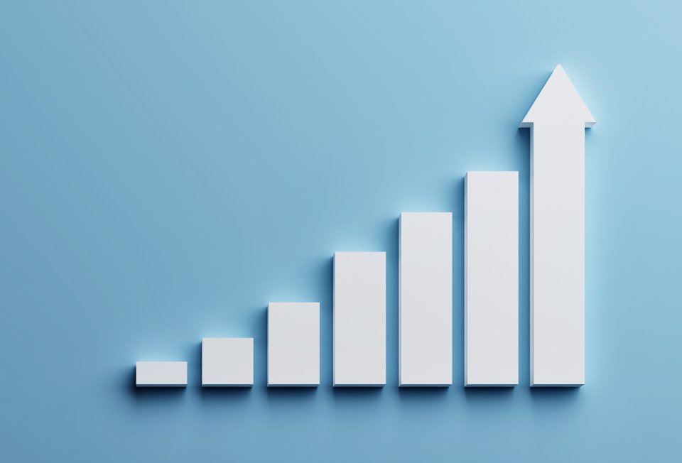 White rising bar chart on blue background with copy space. Business economic and money investment concept. Goal and success theme. 3D illustration rendering graphic design.