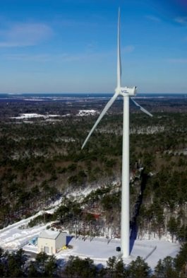 An aerial photo of a wind turbine.