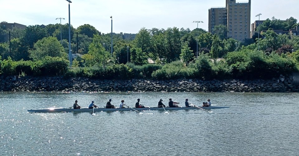 People rowing on Hudson River in Harlem/Bronx area.