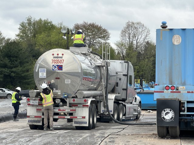 Waste is safely secured and loaded for off-site disposal