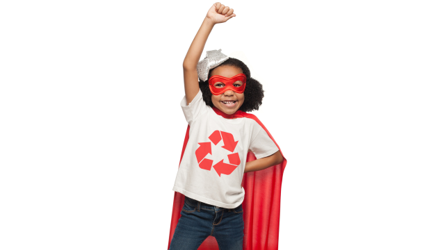 Young girl with a cape and mask on, wearing a t-shirt with the recycling logo on it.