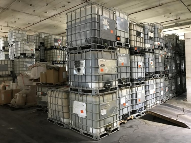 Photo of waste containers at the HPI Chemical Products Removal Superfund Site