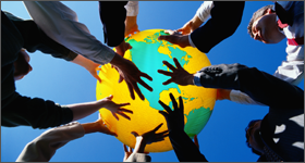 Hands grabbing an inflatable globe from below