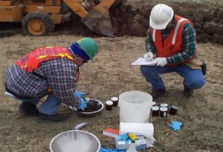 field crew collecting samples in the ground