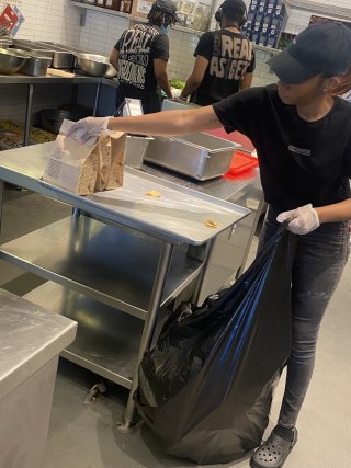 Image of a man working in a kitchen. 