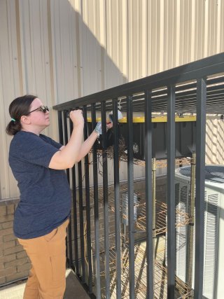 Dr. Weaver checking an air sensor.