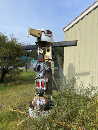 this is a totem pole made of trash