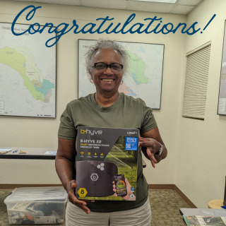 Photo of a women who won a water conservation-related prize from the Tarrant Regional Water District